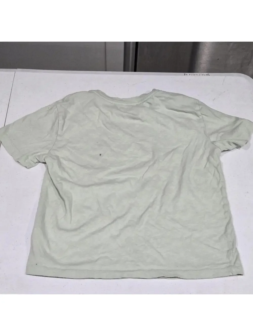 -Light green Old Navy graphic tee with palm trees and a rocket